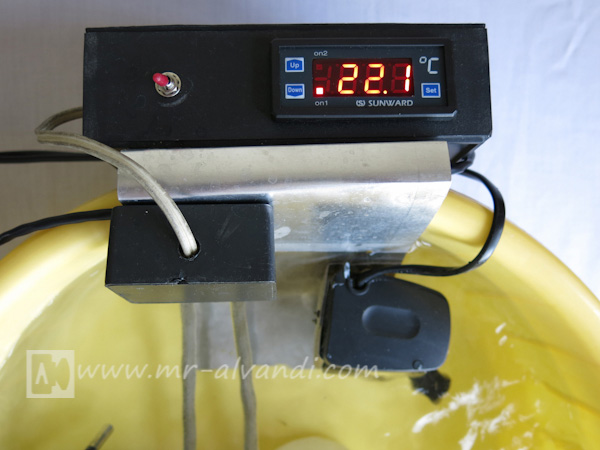 Temperature controller with aquarium pump